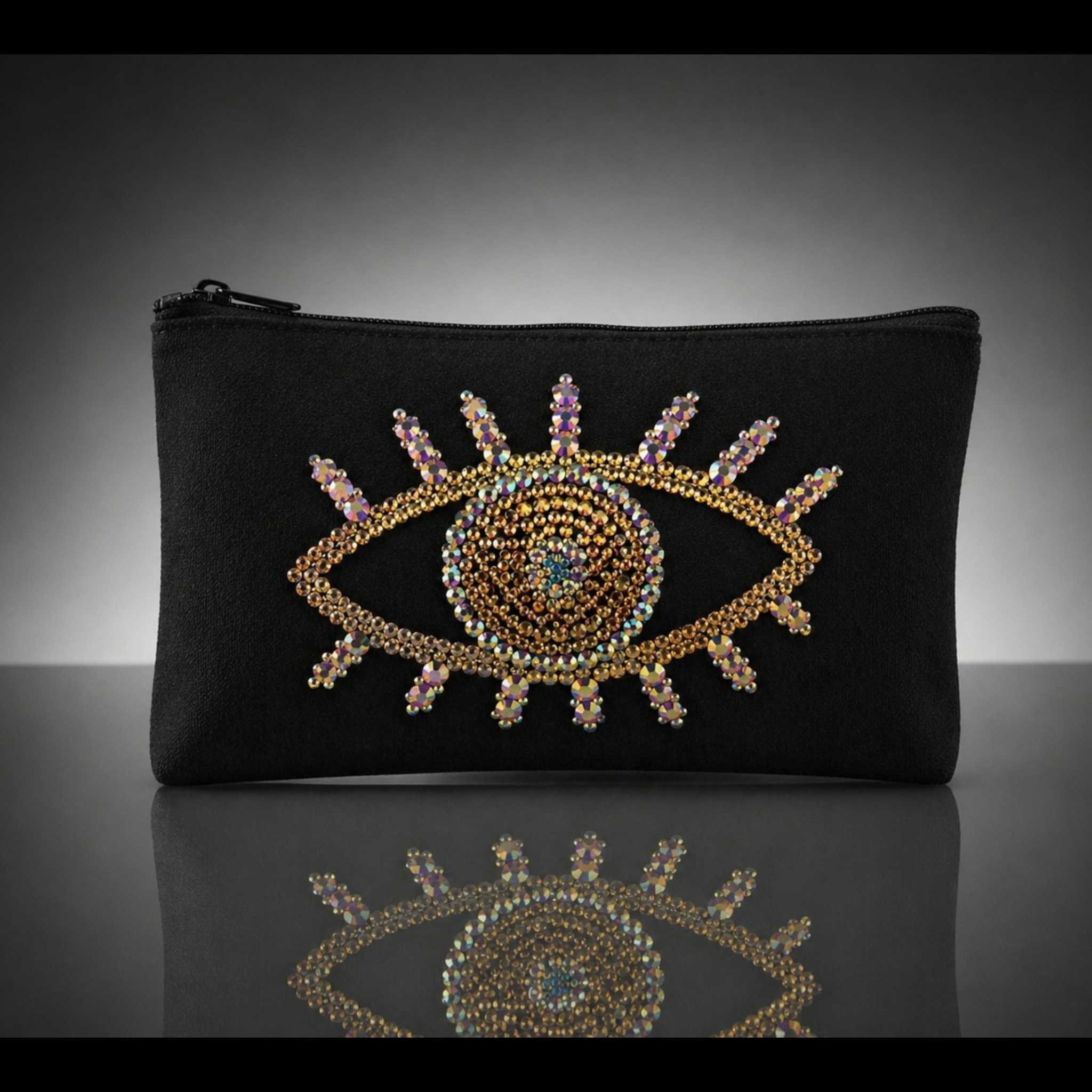 Trousse  faite main avec strass – Pochette œil scintillant 20x11 cm
